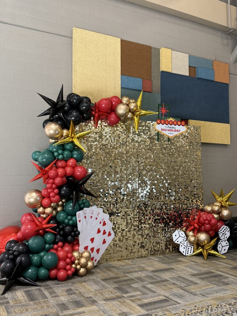A festive backdrop for a holiday party featuring